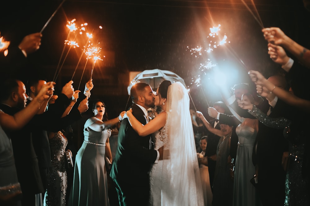 newly wed couple kissing photograph