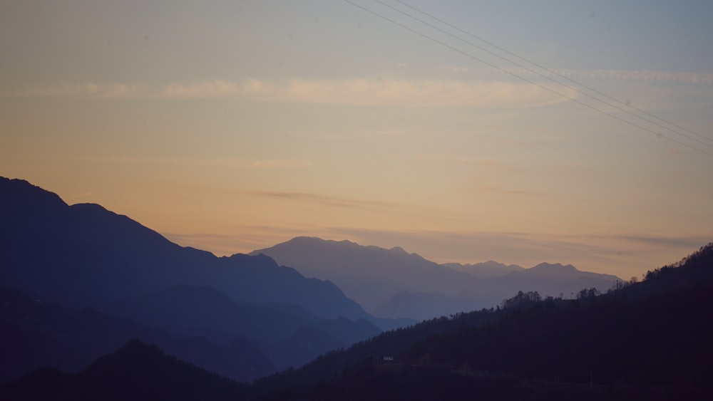 silhouette of mountain during golden hour