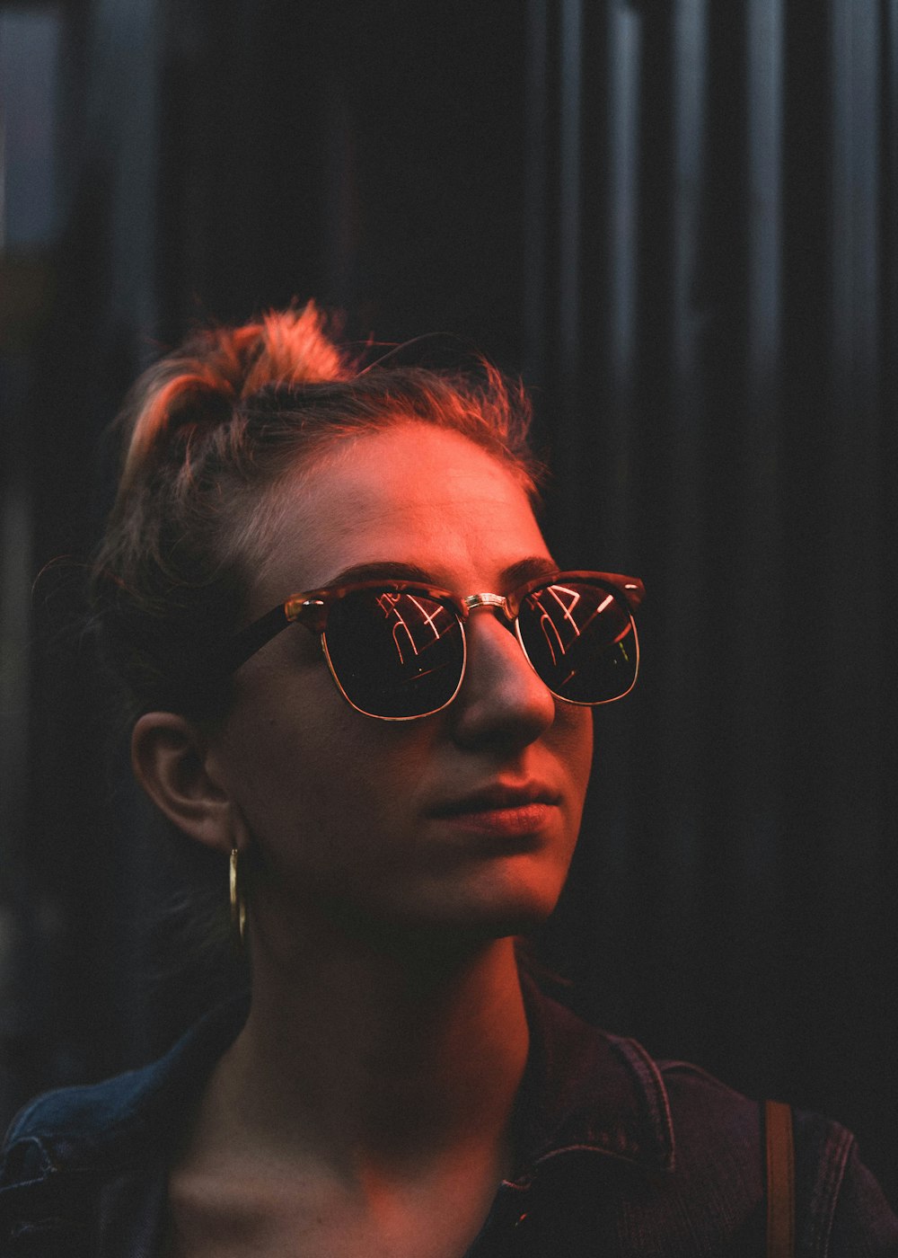 portrait of woman wearing black sunglasses