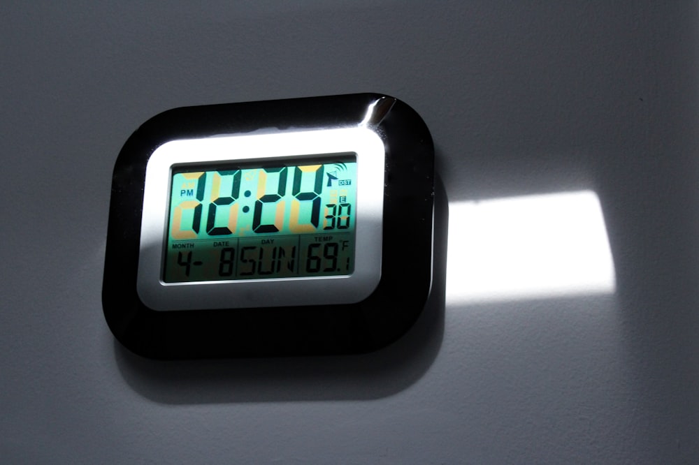 black and gray digital wall clock