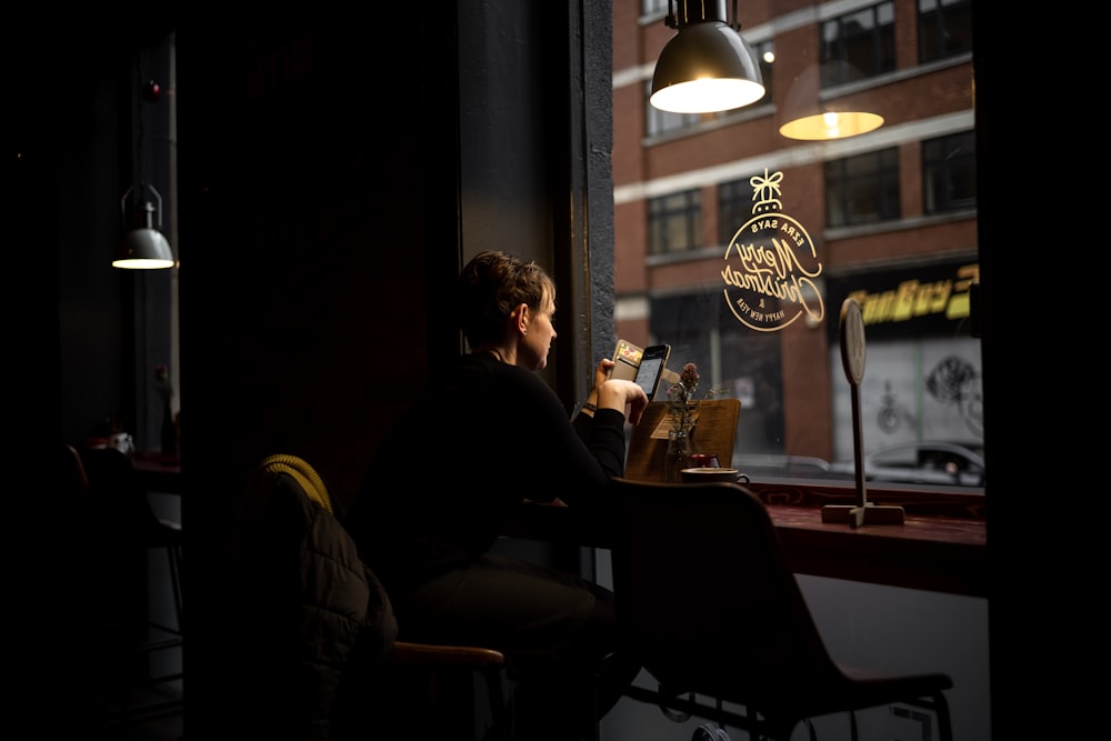 man on desk in library