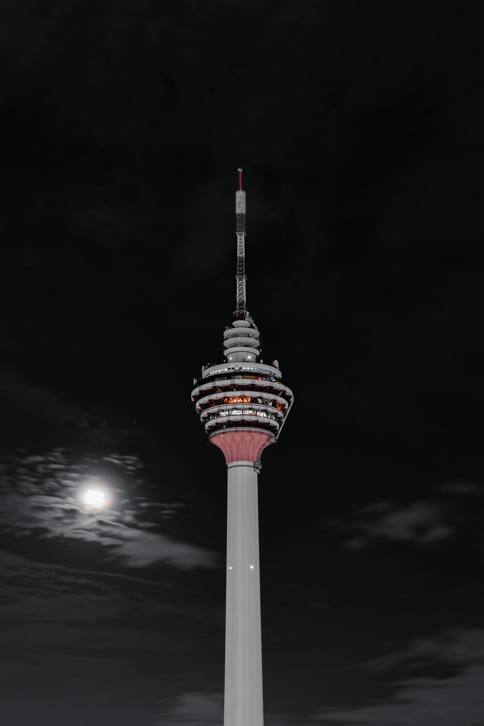 woman wearing yellow long-sleeved dress under white clouds and blue sky during daytime