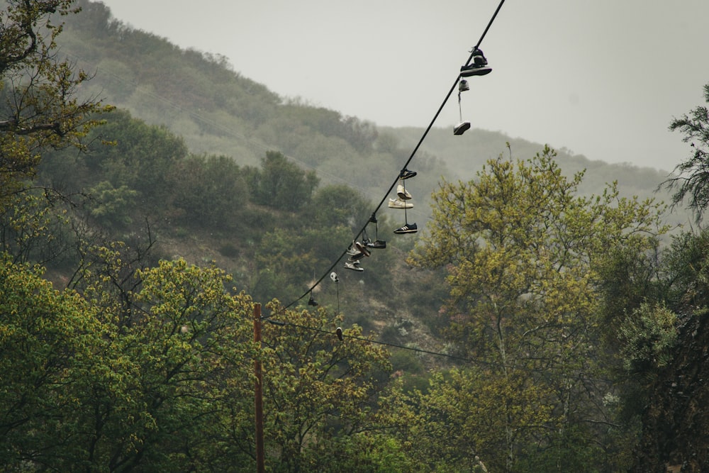 hanged shoes on wire
