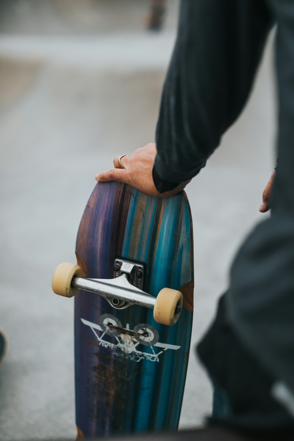 person holding skateboard