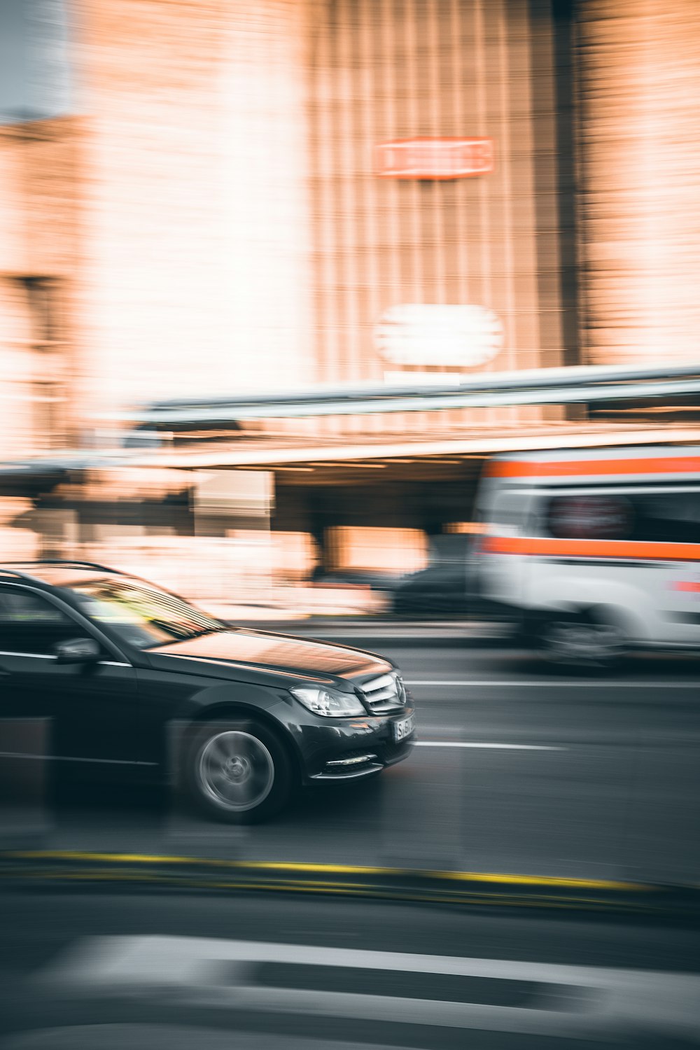 panning photography of vehicle