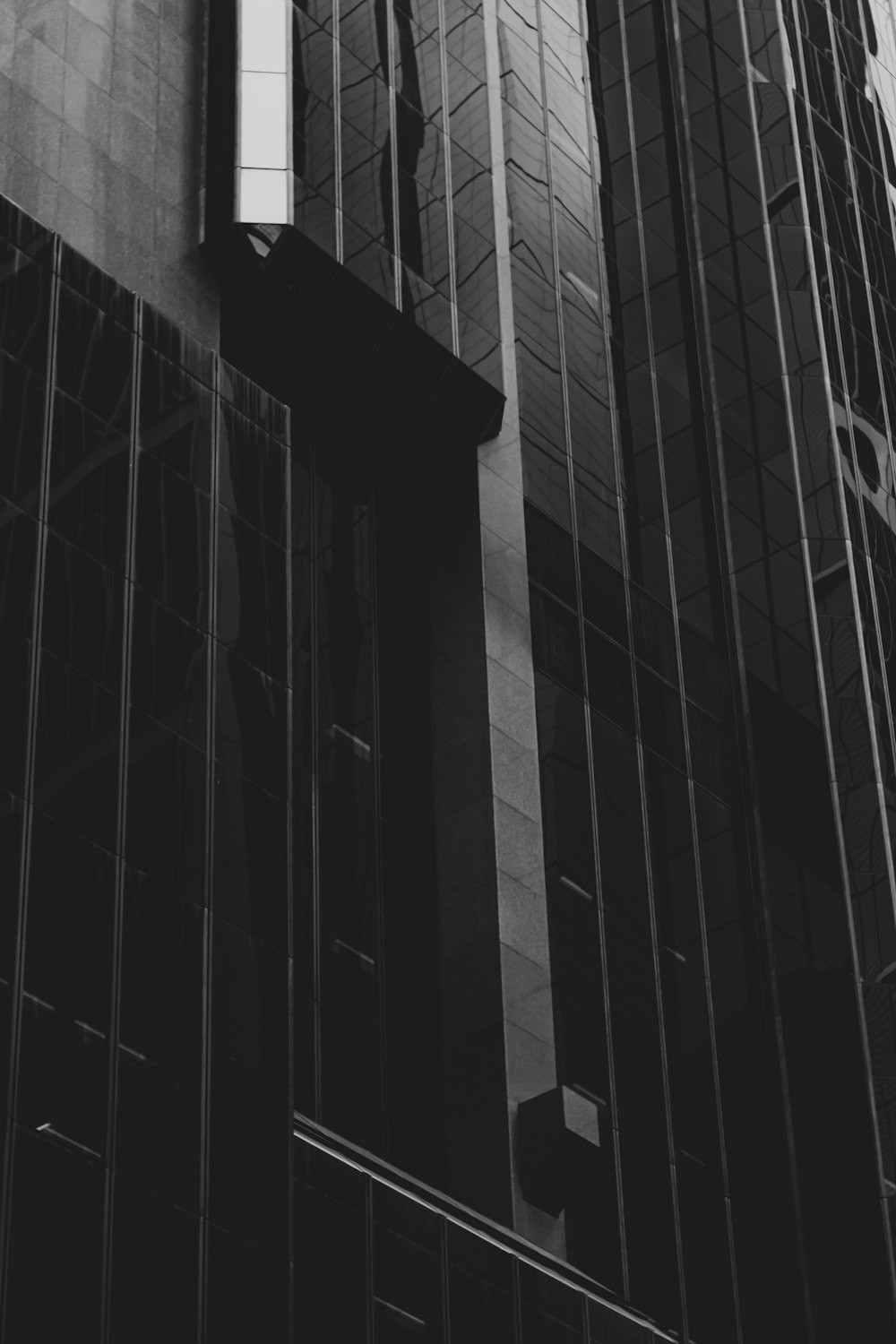 a black and white photo of a tall building