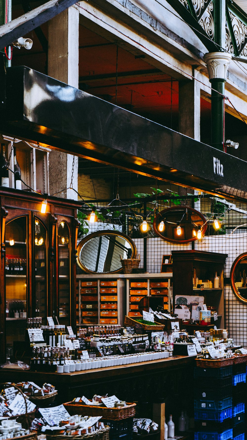 a restaurant filled with lots of food and lots of lights