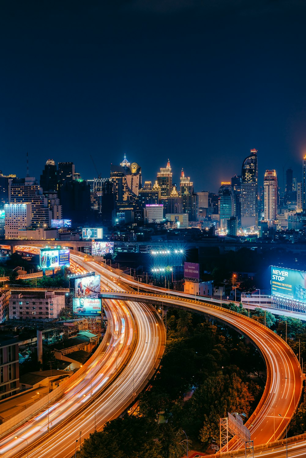 timelapse photography of road and building during nighttime