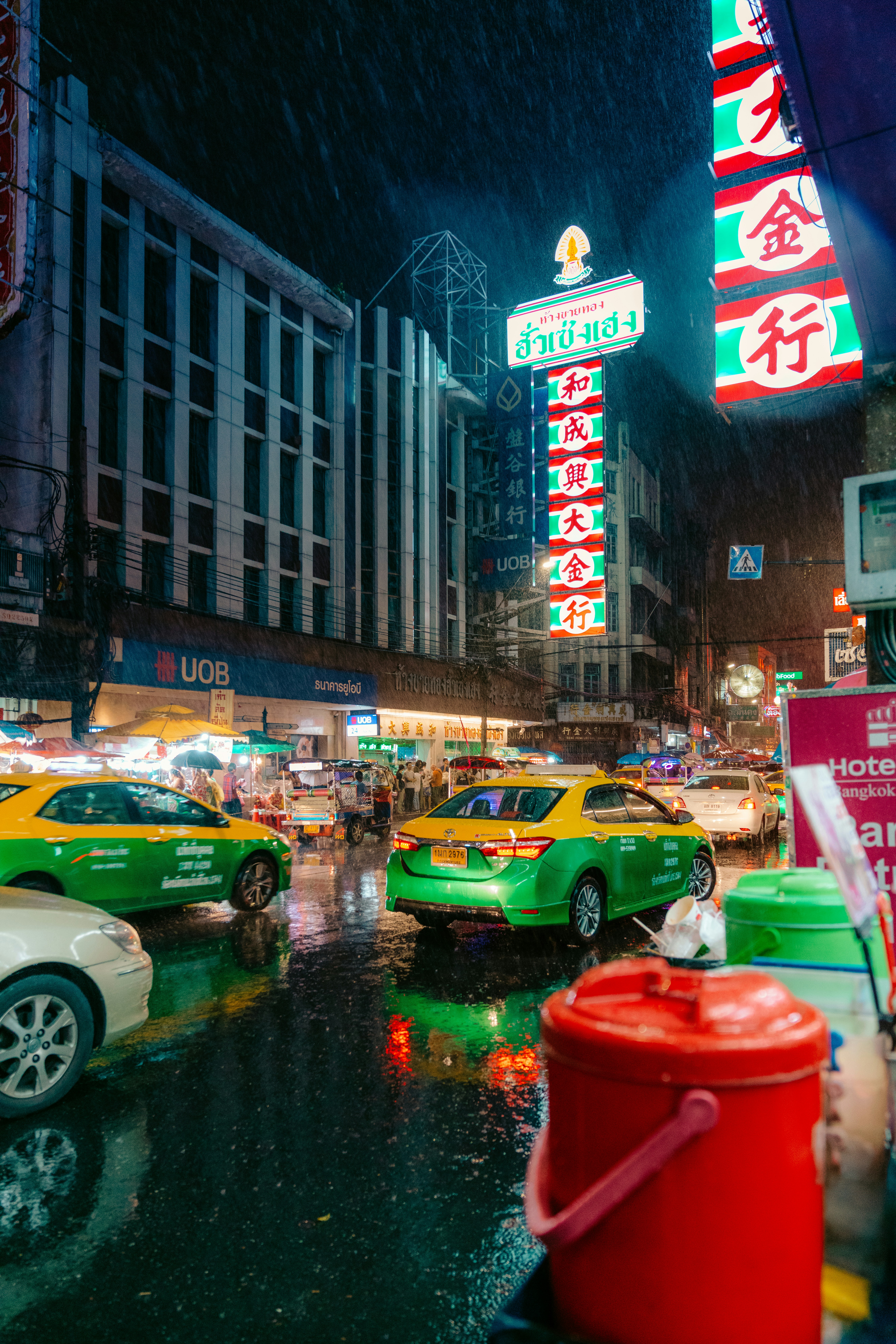 vehicles on road in city during rain