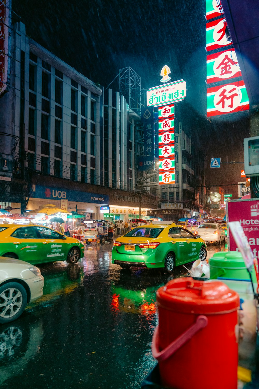 vehicles on road in city during rain