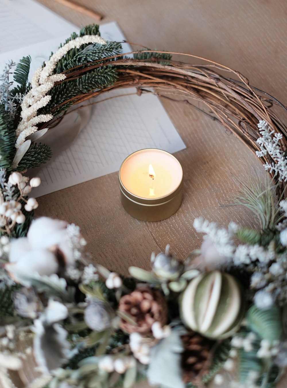 tealight candle on brown surface