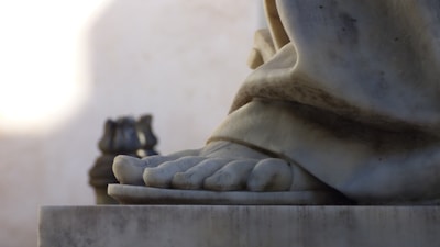 A close-up of a sophisticated sandal with intricate details.