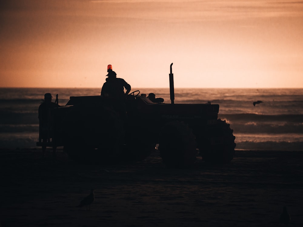 silhouette photography of tractor