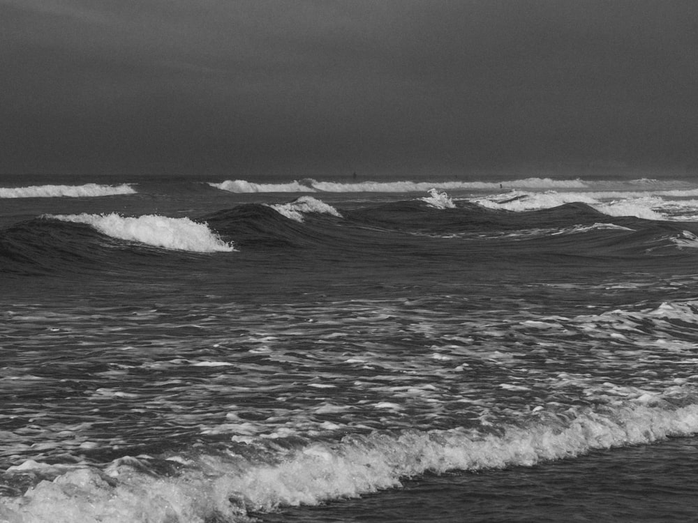 grayscale photography of sea splash