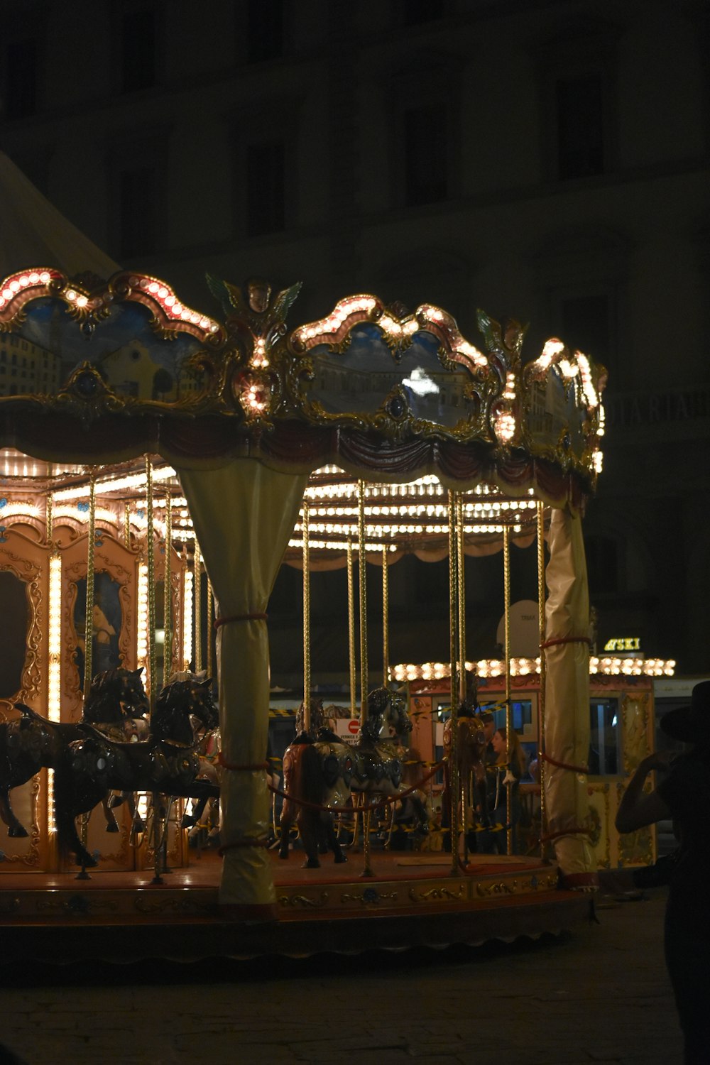 lighted carousel at nigh time