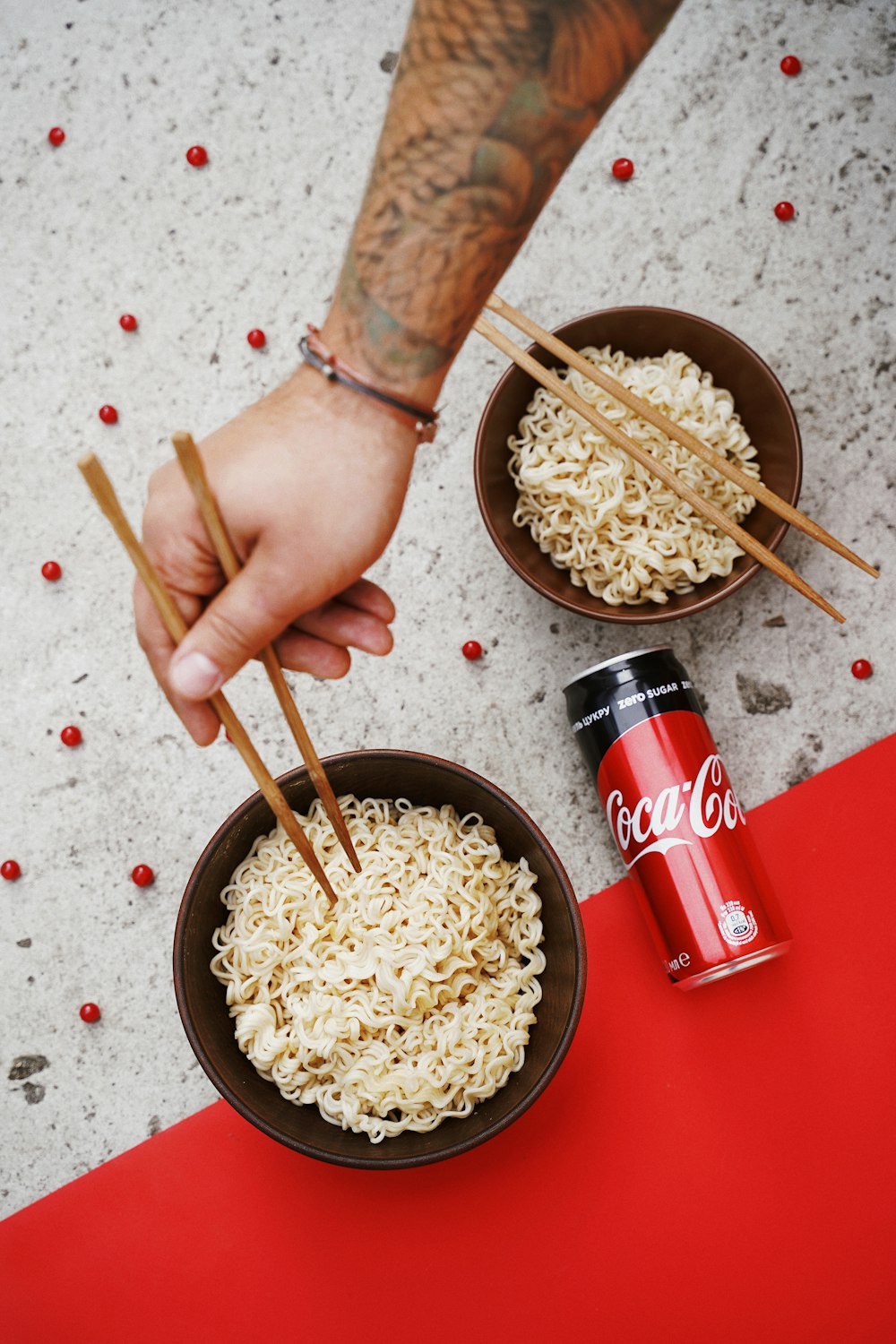 two cooked noodles served on brown bowl