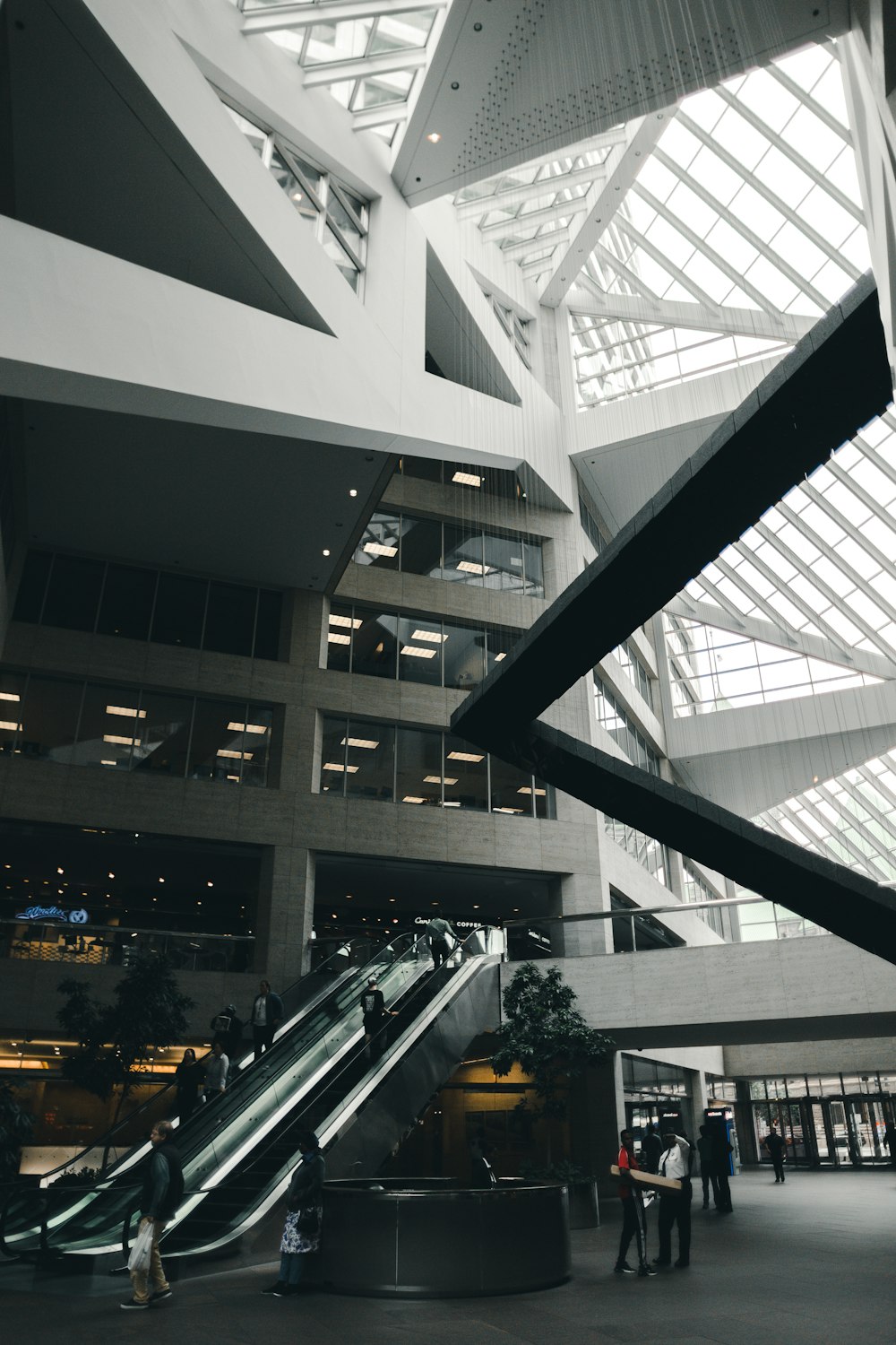 people walking inside white building