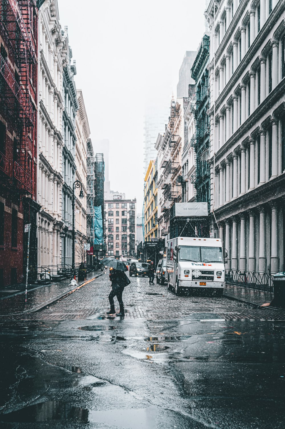 person walking on road