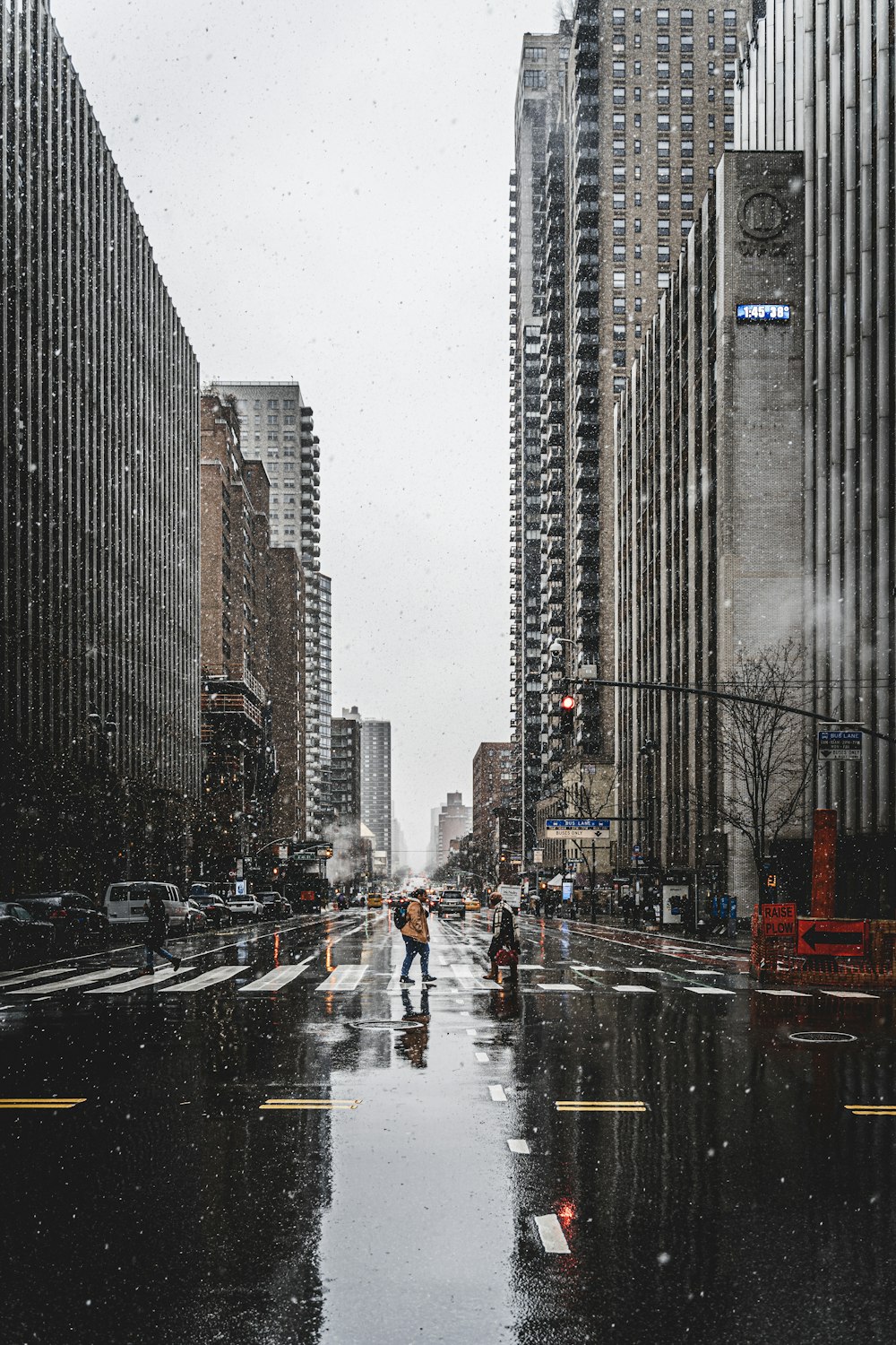 man walking on pedestrian lane