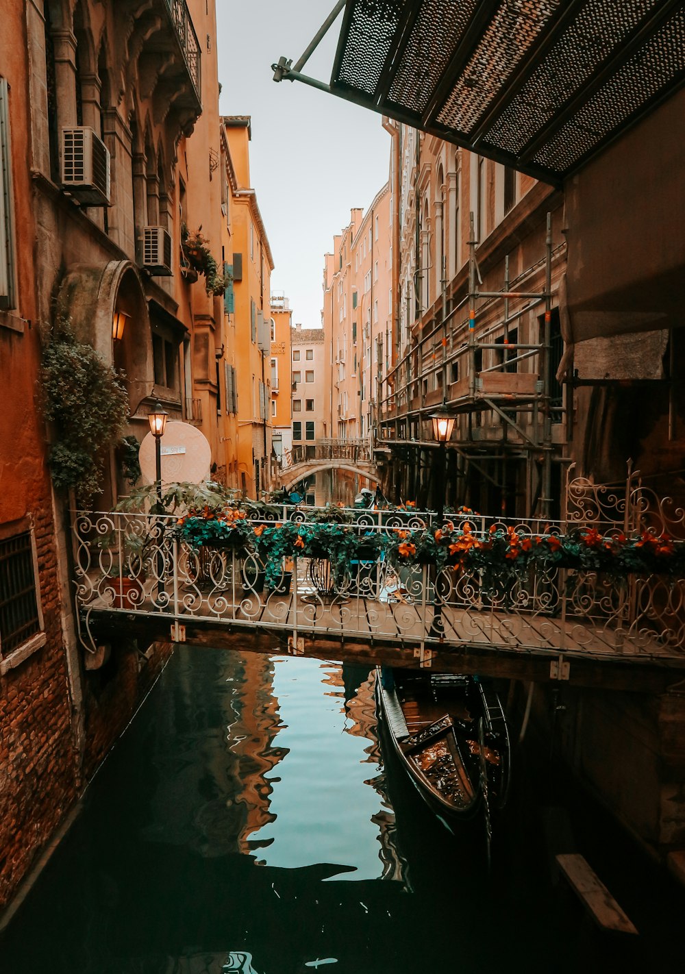 brown bridge and houses scenery