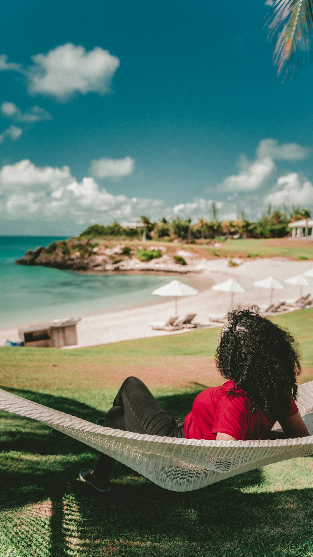 woman lying on hammock