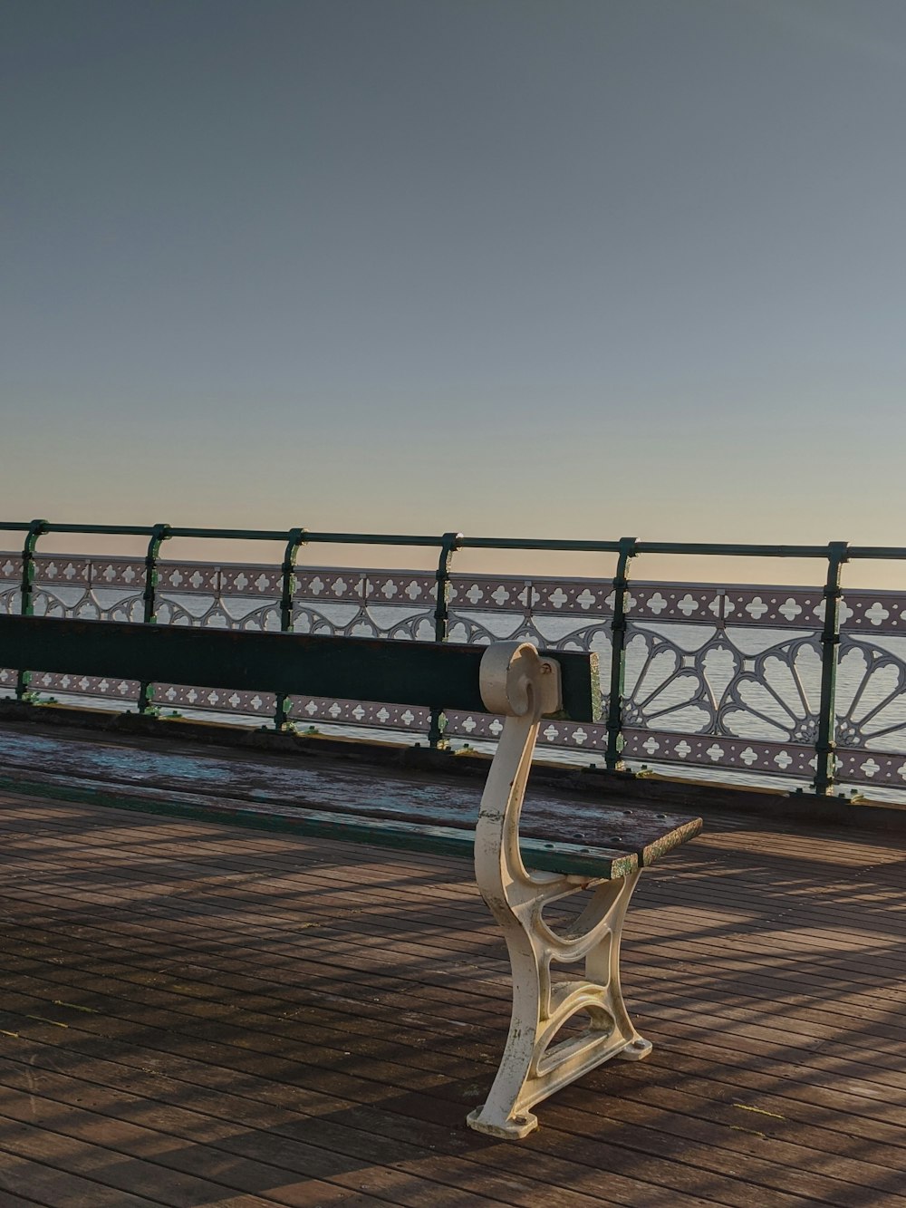 green and white wooden bench