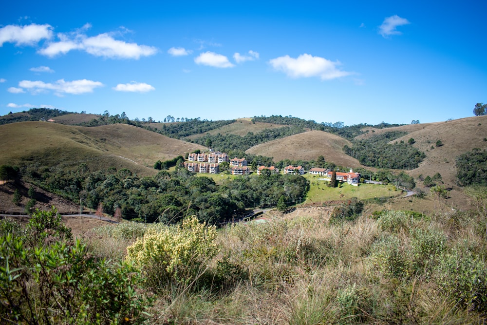 green mountain and grass field