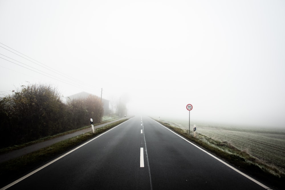 foggy asphalt road scnery