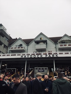 The vibrant Romford greyhound stadium bustling with excitement on race day.