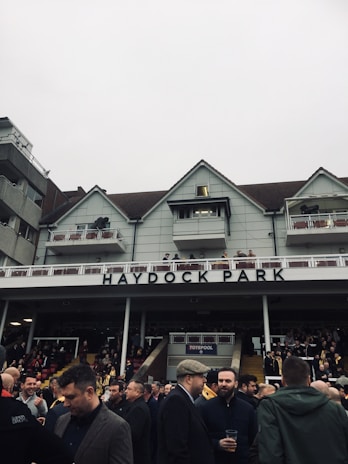 The vibrant Romford greyhound stadium bustling with excitement on race day.
