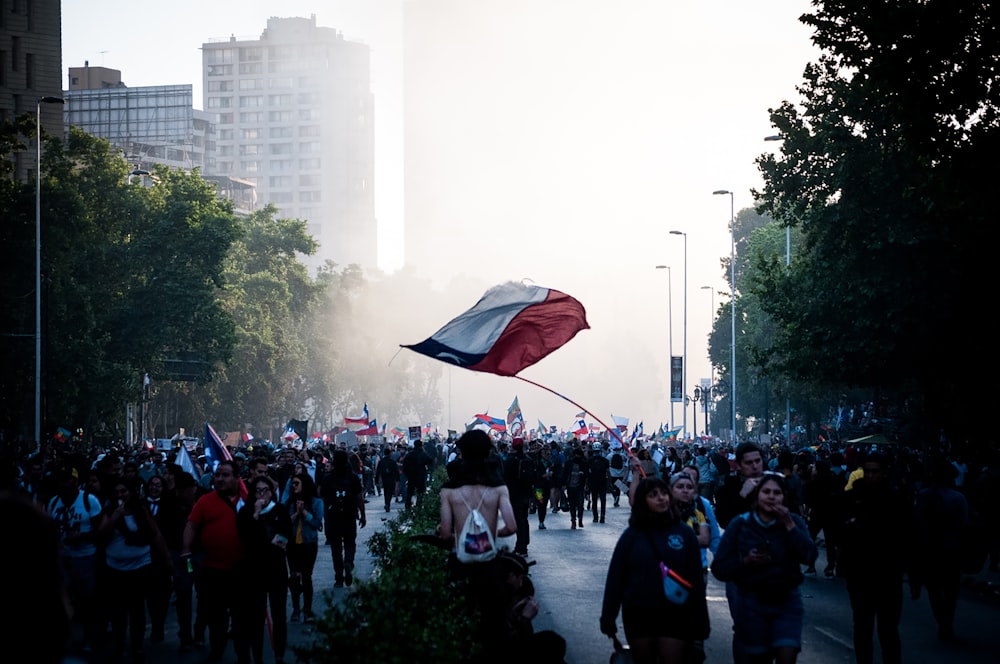 people marching on road