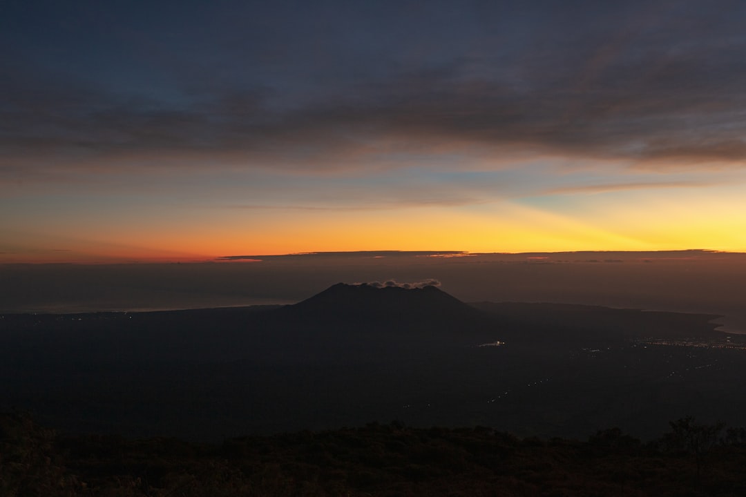 silhouette of mountain during golden hour