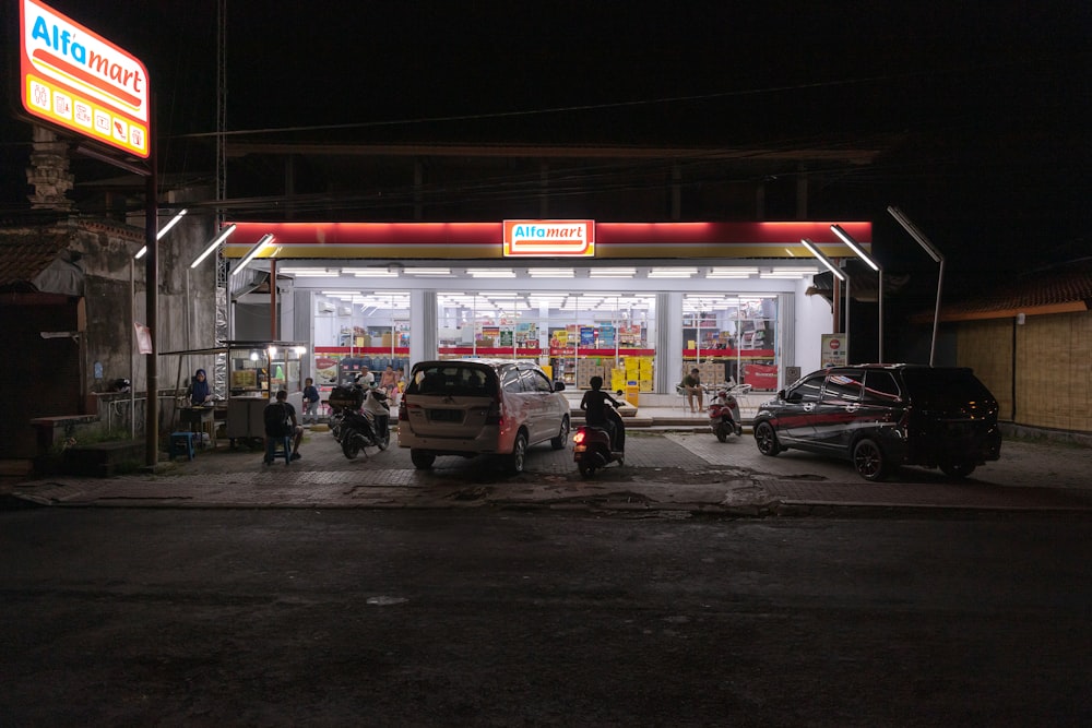 vehicles parked in front of store facade