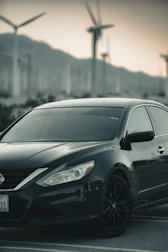 shallow focus photo of black sedan