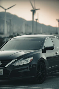 shallow focus photo of black sedan