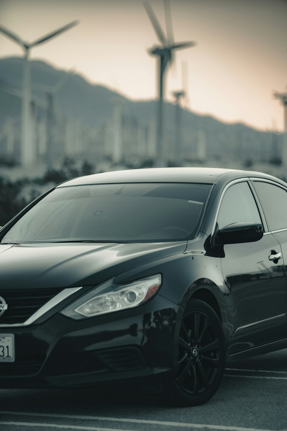 shallow focus photo of black sedan
