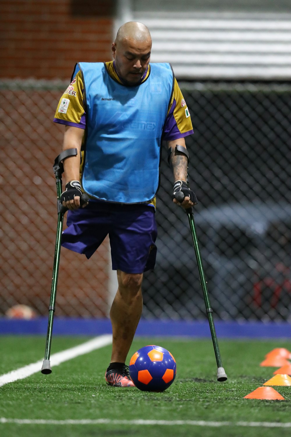 man standing in front of ball