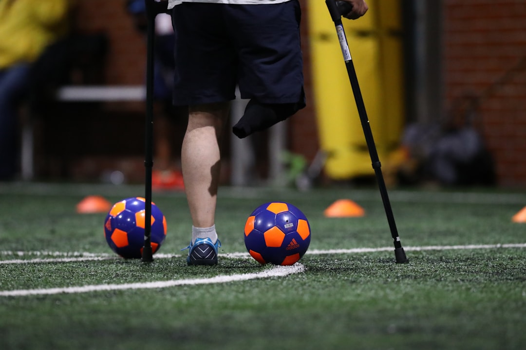 person playing soccer ball