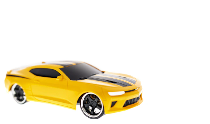 A sleek black and yellow themed digital guidebook cover for buying used cars.
