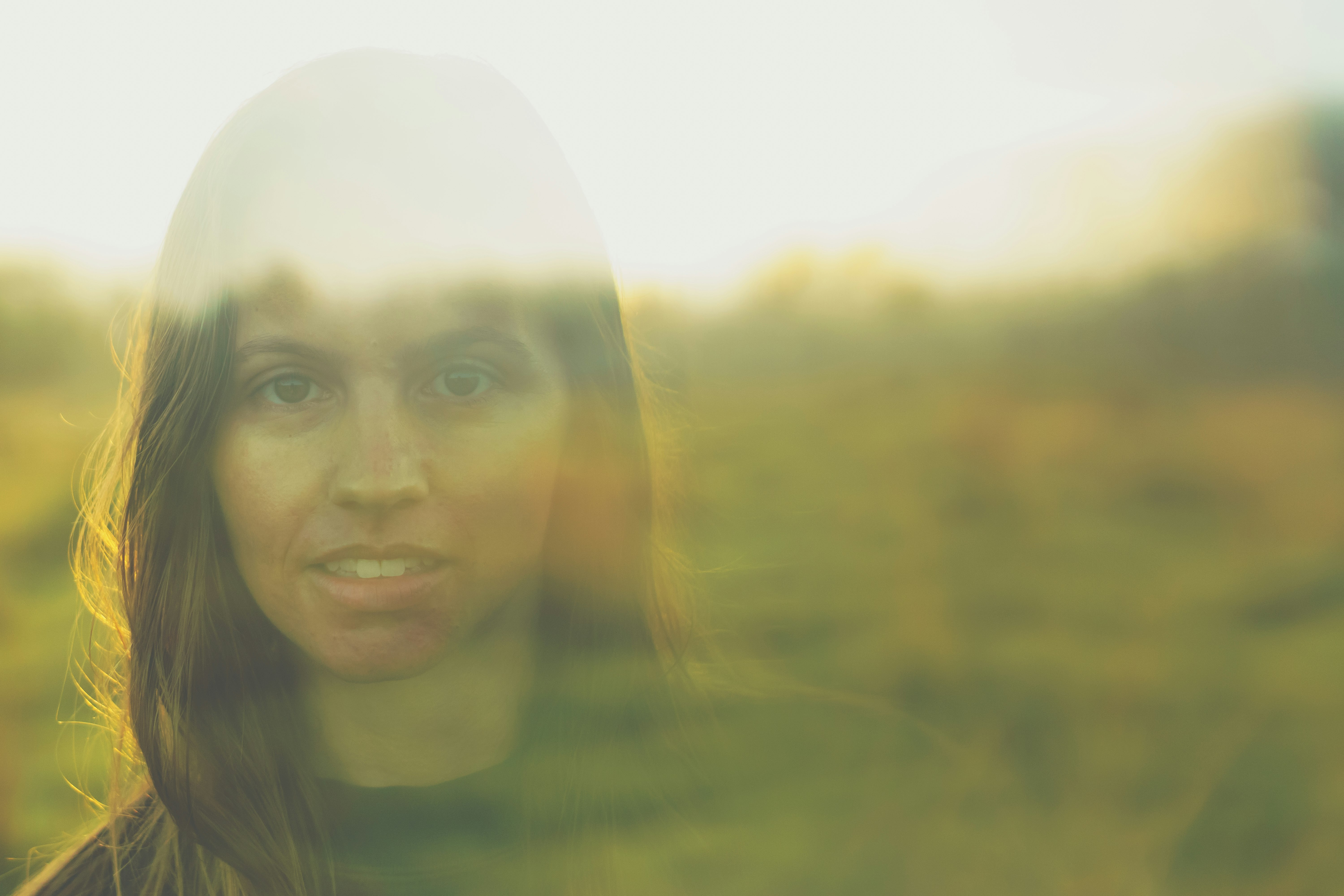 shallow focus photo of woman in black crew-neck shirt