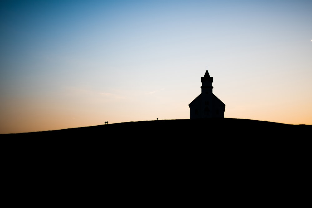 silhouette of building during daytime