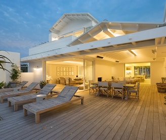 white wooden pool bench near house