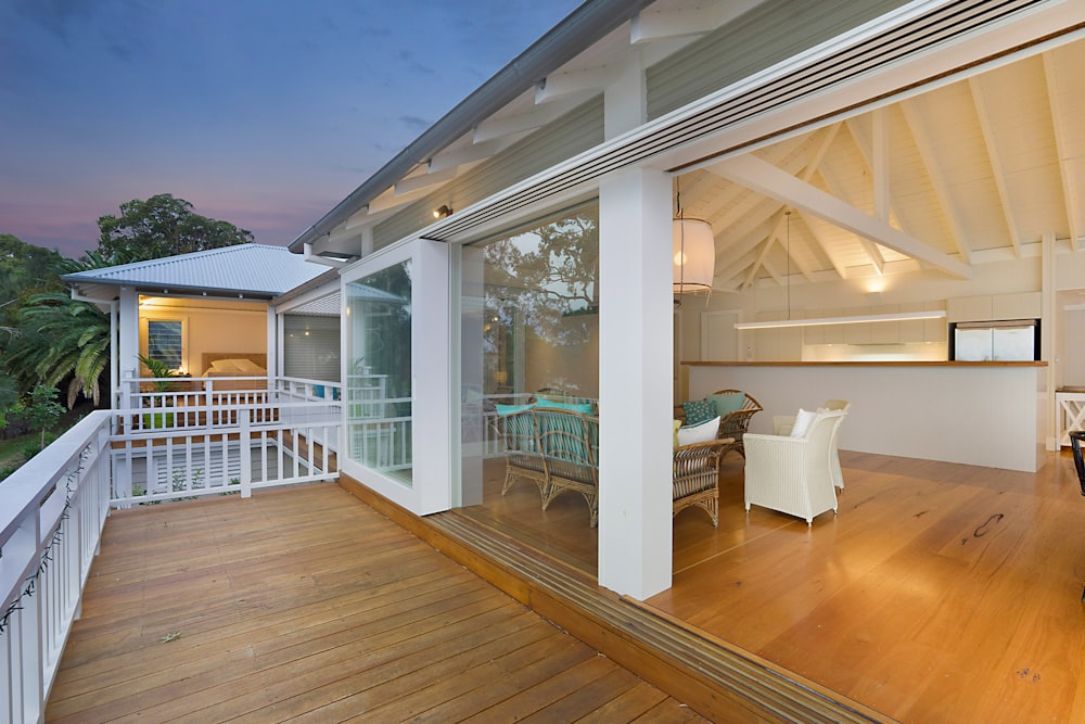 view photography of white wooden house