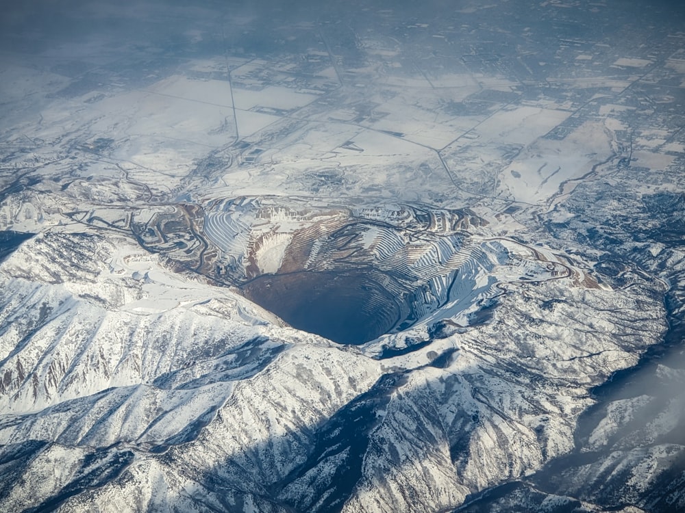 aerial photo of snow covered mountain during daytime