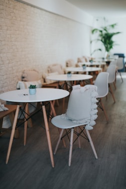Modern minimalist cafe interior with clean lines and cozy seating