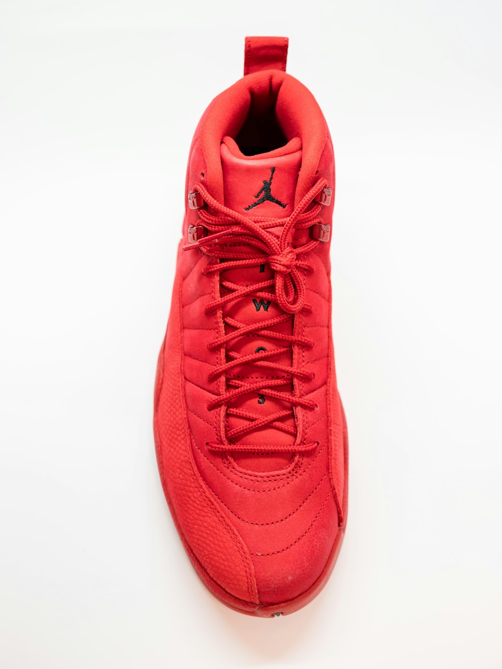 unpaired red Air Jordan 12 shoe