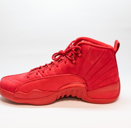 unpaired red Air Jordan 12