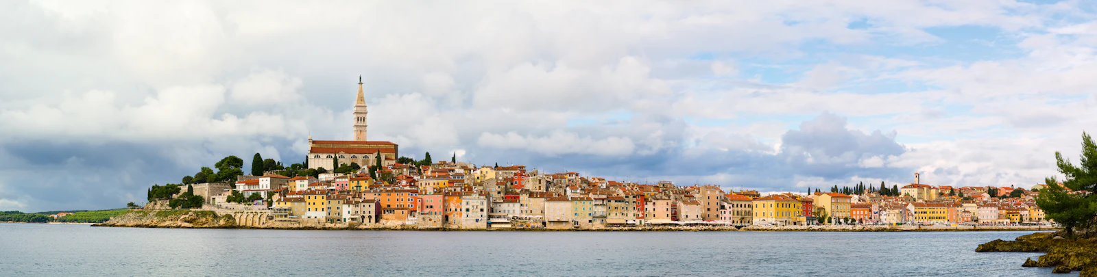 The pastel waterfront and bell tower of Rovinj, Istria