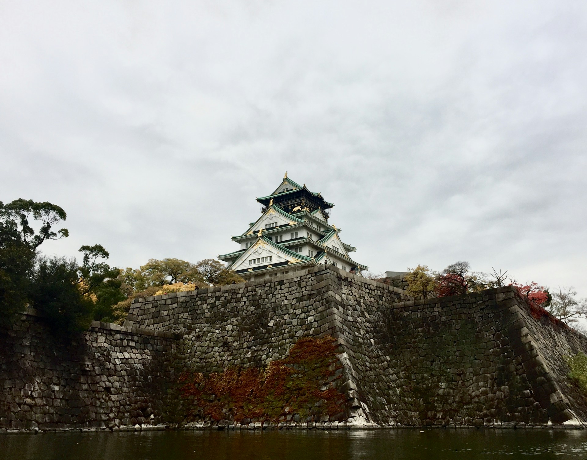 temple in front of calm body of water