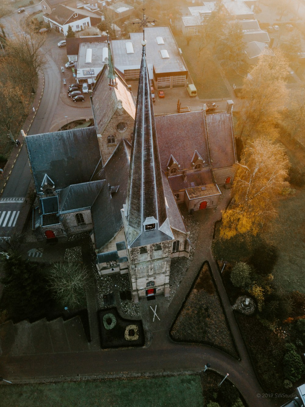 aerial photography of houses and church during daytime
